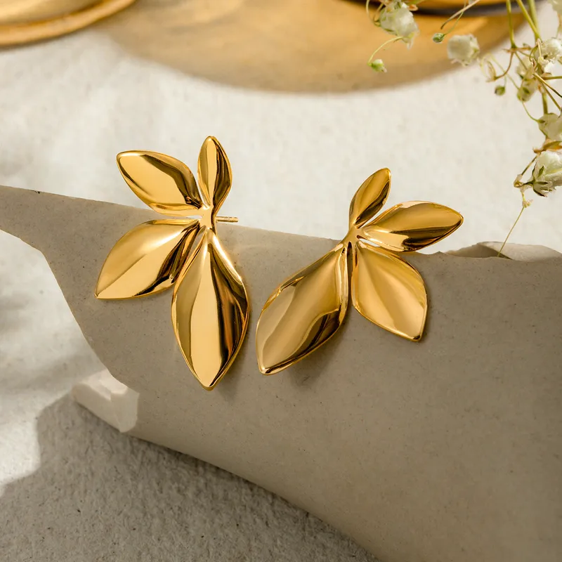 Golden Leaf Statement Stud Earrings - Image 2