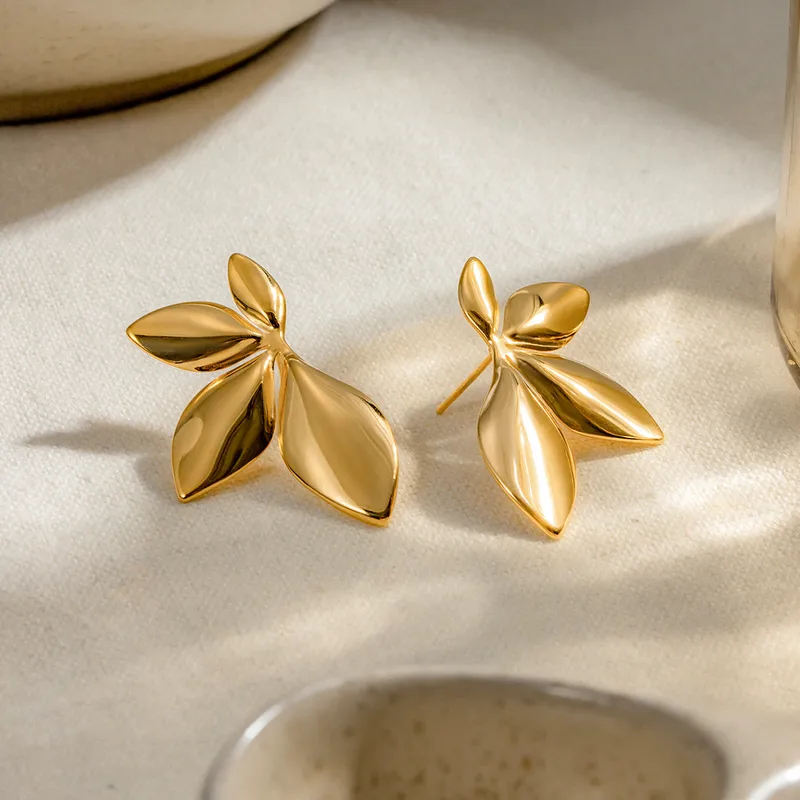 Golden Leaf Statement Stud Earrings - Image 5