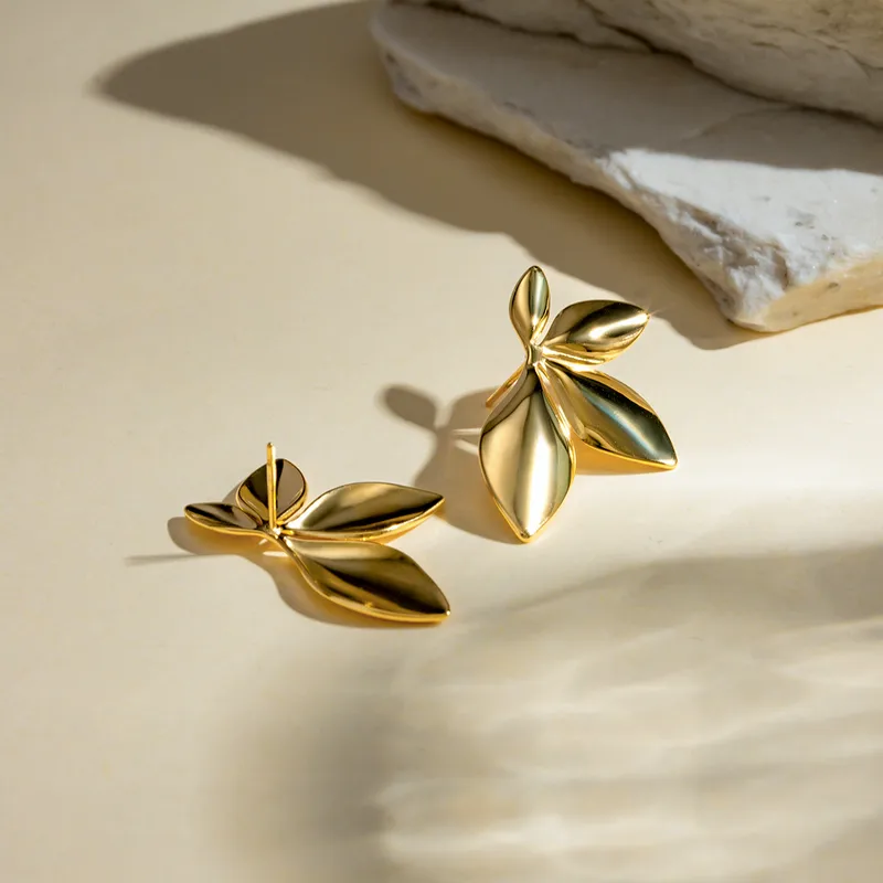 Golden Leaf Statement Stud Earrings - Image 6